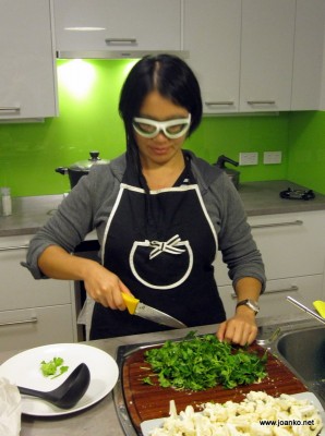 Onion goggles in the kitchen (obviously posed, as I'm chopping parsley)